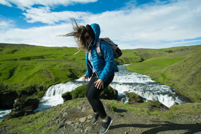 Full length of man on mountain against sky