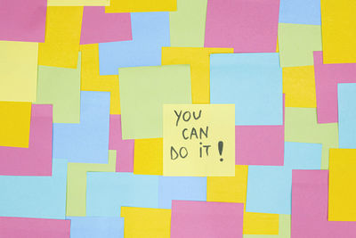 Multicolored sticky paper notes with a written message you can do it