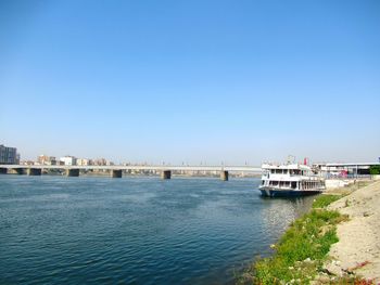 Scenic view of sea against clear blue sky