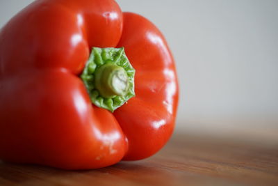 Close-up of red bell peppers on table