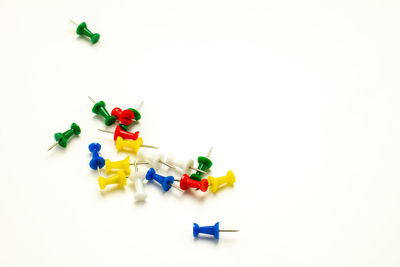 High angle view of toys over white background