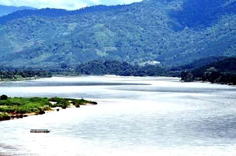 mountain, water, tranquil scene, scenics, tranquility, beauty in nature, mountain range, nature, tree, lake, river, landscape, waterfront, transportation, non-urban scene, sky, idyllic, nautical vessel, day, sea