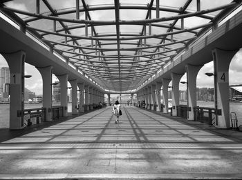 People walking on bridge