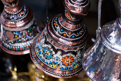Close-up of bells for sale in market