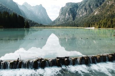 Scenic view of lake by mountains