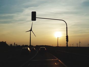 Street light against sky during sunset