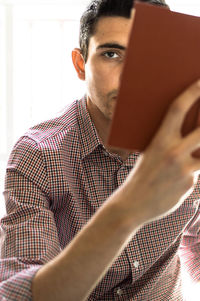 Portrait of young man looking away