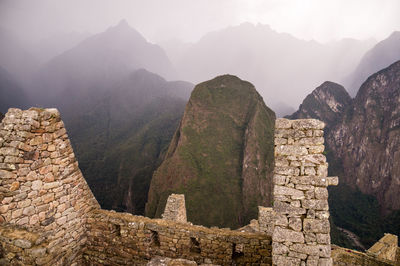 Stone wall with mountain in background