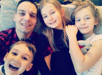 Portrait of happy siblings