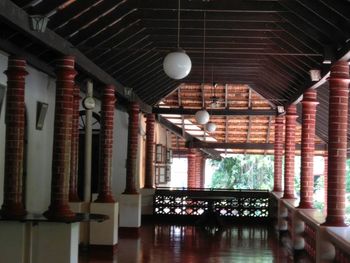 Illuminated lights hanging in corridor