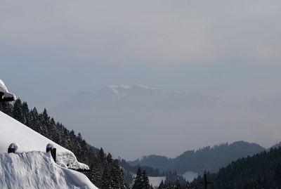 Scenic view of snow covered mountains