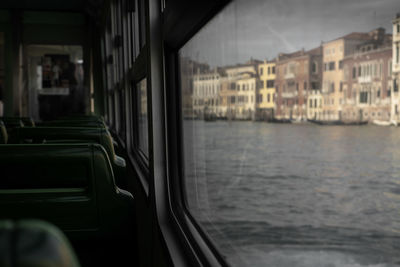 View of venise city through vaporetto window