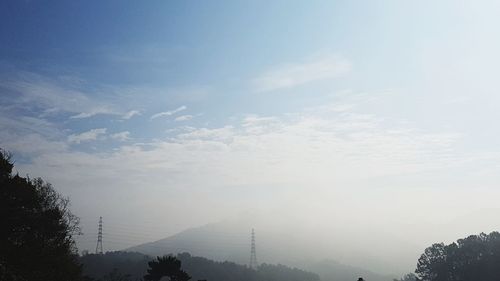 Scenic view of silhouette mountains against sky