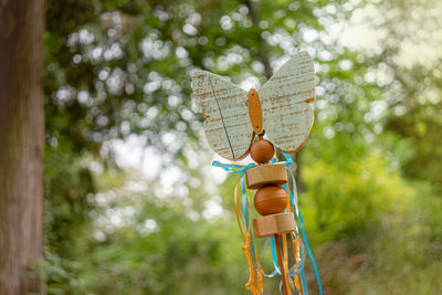 Low angle view of stuffed toy on tree