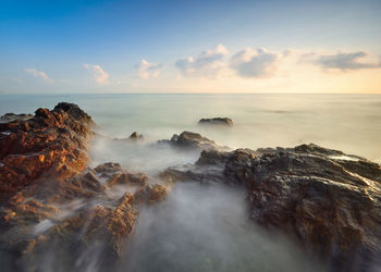 Scenic view of sea against sky during sunset