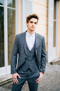 Portrait of young man standing outdoors