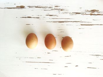 Close-up of eggs in container on table