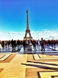 Tourists against clear sky