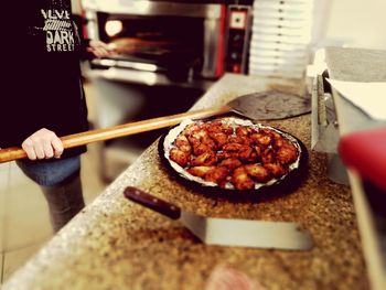 Close-up of person preparing food