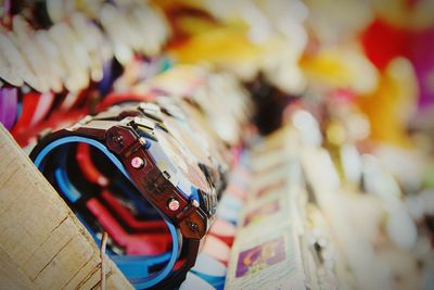 Close-up of wristwatches for sale at market