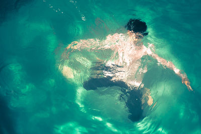 Man swimming in sea