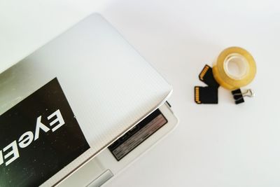 Close-up of white object over white background