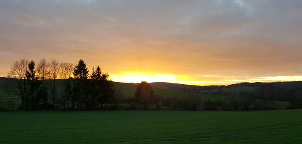 Scenic view of sunset against sky