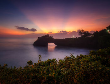 Scenic view of sea against sky during sunset