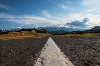 Surface level of road against sky