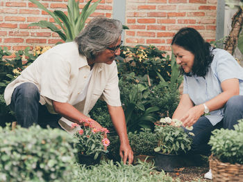 People on flowering plants