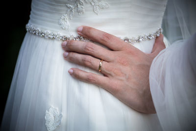 Close-up of couple holding hands