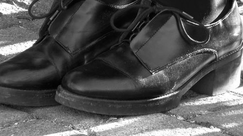 Close-up of shoes on snow