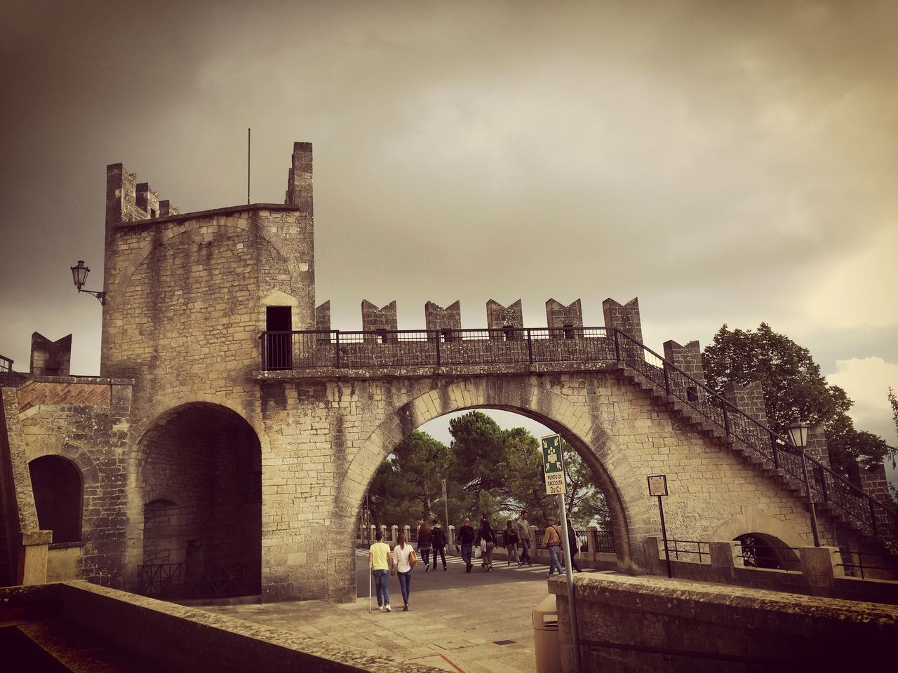 architecture, built structure, building exterior, history, sky, arch, the past, old ruin, ancient, old, famous place, travel destinations, low angle view, tourism, cloud - sky, travel, ancient civilization, international landmark, day, historic