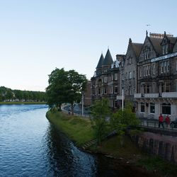 River by city against clear sky