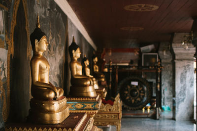 Statue in temple outside building