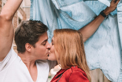 Portrait of couple kissing