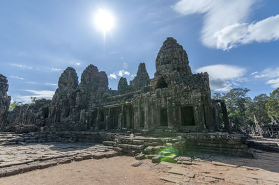 Old temple against cloudy sky