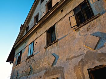 Low angle view of old building against clear sky