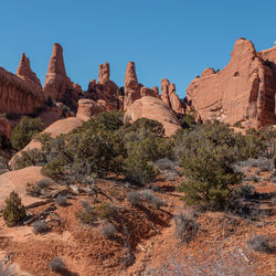 Rugged terrain and towering fin-like sandstone rock formations