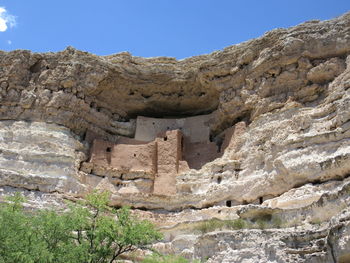 Low angle view of old ruins against sky