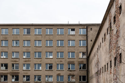 Low angle view of buildings against clear sky