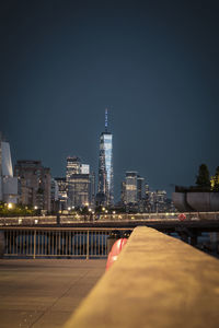 Illuminated buildings in city at night