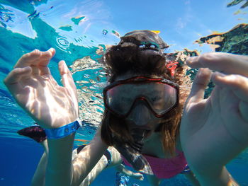 Girl swimming in sea