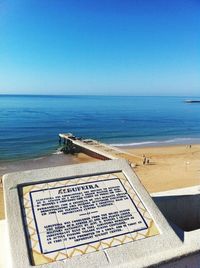 Scenic view of sea against blue sky