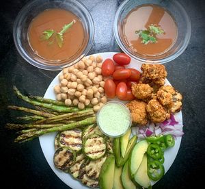 High angle view of vegetables in plate on table