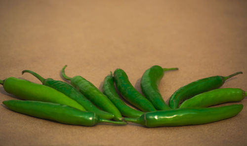 High angle view of green chili pepper on table