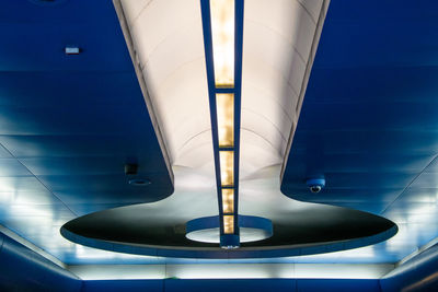 Low angle view of illuminated lights on ceiling