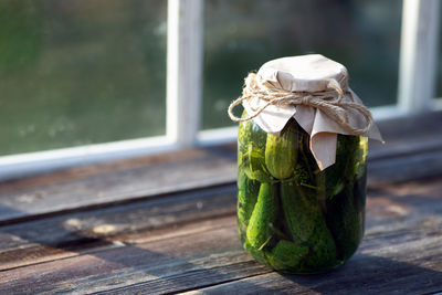 Close-up of drink in glass jar on table
