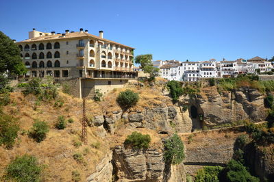 View of old building in city on ravine edge