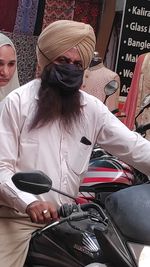 Rear view of people sitting in bus